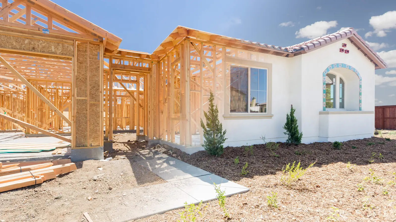 ADU framing next to a finished home in Temecula, California