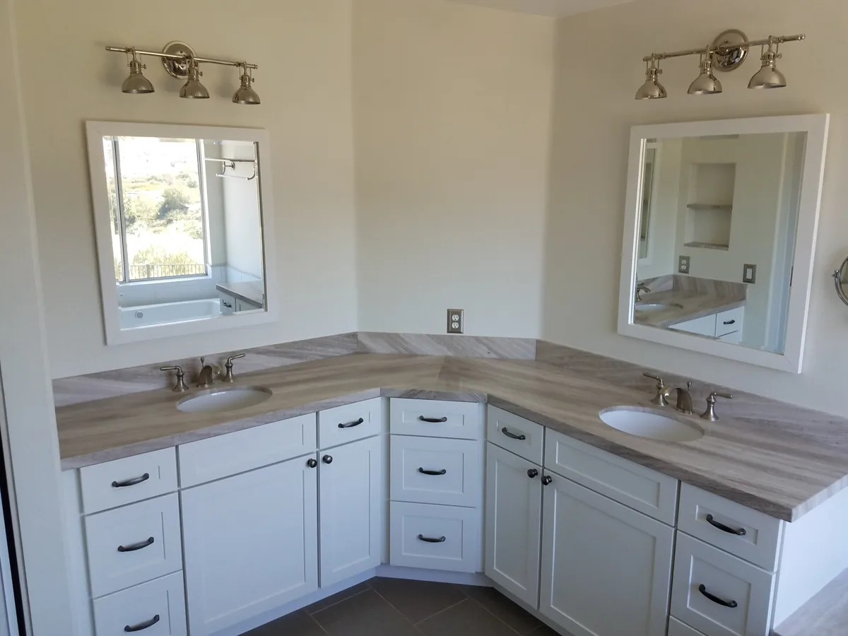 Corner double vanity with quartz counter
